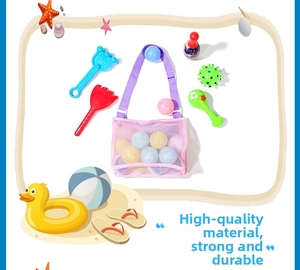 Pink mesh storage bag for kids' beach toys featuring colorful balls and sand shovels
