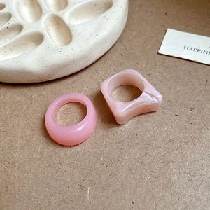 Pink marble texture resin rings set featuring round and square geometric designs