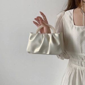 Elegant white ruched cloud handbag with luxury pearl handle for women's crossbody style