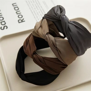 Elegant wide twisted headband set in matte chiffon texture with neutral earthy tones