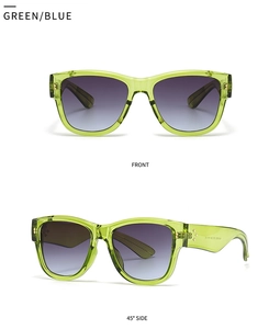 Front and 45-degree side view of green transparent cat-eye sunglasses with gradient lenses