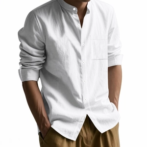 Detailed close-up of white linen shirt texture with mandarin collar and pocket