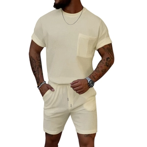 Men's summer waffle knit set featuring short sleeve t-shirt with pocket and matching shorts