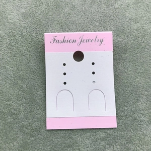 Pink and white Fashion Jewelry display card with 6 holes for earrings and necklaces