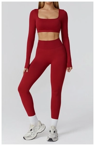 Detail of seamless dark red yoga set featuring hollow-out back and high waist leggings