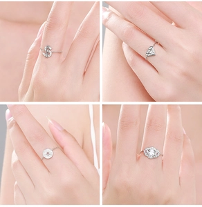 Detailed close-up of S925 silver chain rings featuring zircon-set geometric charms