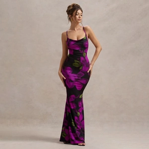 Detail of floral print maxi dress with slim fit mermaid hem and crisscross straps