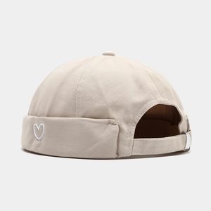 Beige cotton docker hat with heart embroidery and adjustable metal buckle strap