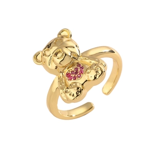 Adjustable golden copper ring featuring a cute bear with a red heart-shaped zircon stone