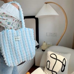 Close-up of blue white striped cloud texture tote bag with LOVE SOZAKKA woven label