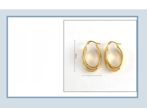 Detail view of 18K gold plated twisted oval earrings with size markings 40mm x 20mm
