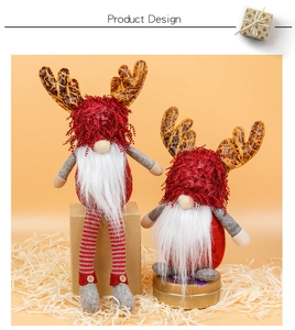 Detail of red Christmas reindeer gnomes in two sizes on warm orange background