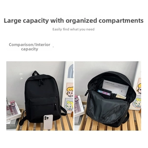 Detail showing spacious interior compartments and laptop sleeve of the black nylon backpack