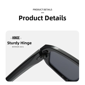 Detailed close-up of the sturdy metal hinge and polished black frame on fashion sunglasses