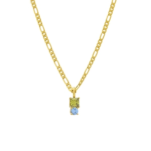 Dettaglio della catena Figaro in oro 18K con zirconi verdi quadrati e blu tondi