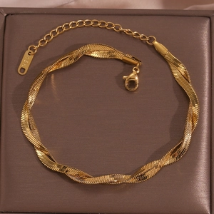 Detail showing 18K gold-plated double-layer braided snake chain anklet with lobster clasp