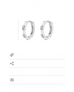 Macro shot of 925 sterling silver hoop earrings with white enamel and 1cm diameter scale