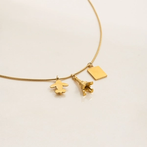 18K gold plated stainless steel necklace with airplane, Eiffel Tower and passport charms