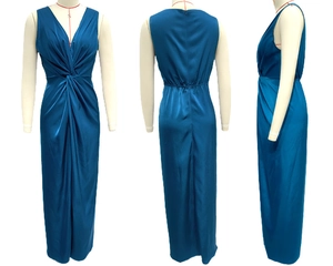 Three-view display of a deep blue V-neck sleeveless maxi dress with waist twist detail