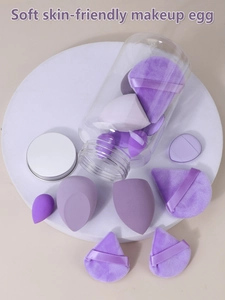Detail of 14-piece purple non-latex sponge set and puff in clear storage container