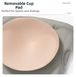Détail de coussinets de soutien-gorge de sport amovibles et respirants en beige