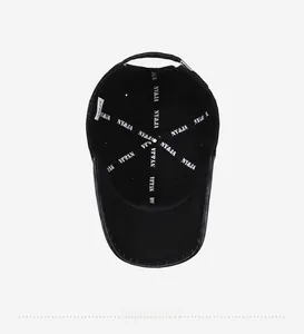 Detail view of black baseball cap interior with reinforced NY&JA straps and metal buckle
