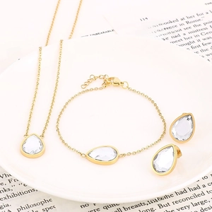 Parure de bijoux élégante en acier titane doré avec zircons en forme de goutte