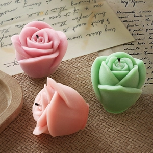 3D realistic rose flower scented candles in pink and green colors on a rustic background