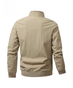 Back view of a khaki military flight jacket with stand collar and ribbed hem details