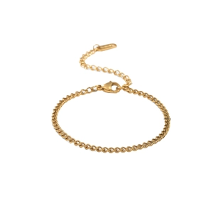 Polished gold stainless steel Cuban link bracelet with lobster clasp on white background