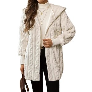 Detailed texture of cream cable knit hooded cardigan in soft faux shearling material