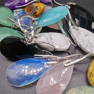 Polished teardrop faceted gemstone earrings in various colors with silver hooks