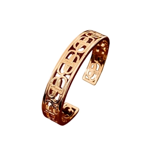 Polished 18K gold-plated open bangle with hollowed-out letter patterns for women
