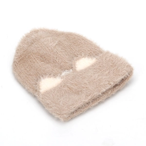 Detailed view of plush cat ear hat with white heart pattern and soft faux mink texture