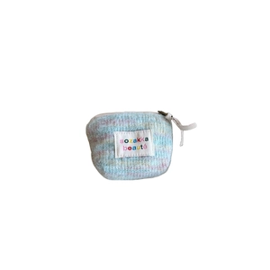 Plush multicolor mini makeup bag for lipsticks with zipper closure and soft texture