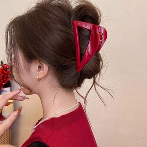 Elegant deep red acrylic triangle hair claw clip for thick hair styling on back of head