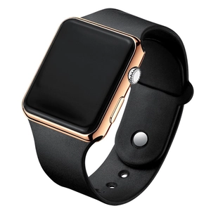 Detail view of stylish square LED watch with rose gold frame and black silicone strap