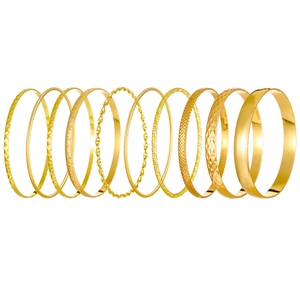 10-piece gold ethnic alloy bangle set with smooth polished and textured finishes
