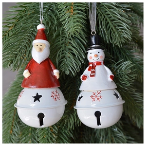 Detail of Christmas bell ornaments with snowman and Santa figures hanging on green pine tree