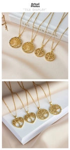 Detail display of golden Tree of Life pendants featuring sparkling colorful zircon crystals