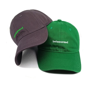 Minimalist cotton baseball cap with letter embroidery in taupe and vibrant green