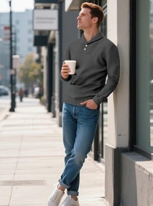 Detail of men's charcoal waffle knit polo showing fabric texture and buttoned collar