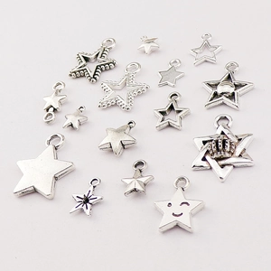 Assorted silver alloy star pendants with hollow and solid designs for DIY jewelry making