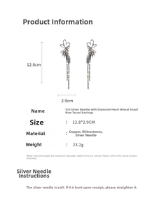 Detailed view of silver bow and heart tassel earrings with rhinestone and dimensions