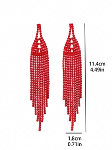 Detail showing red rhinestone tassel earrings dimensions: 11.4cm length and 1.8cm width