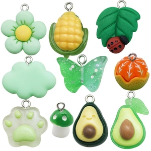 Set of 10 colorful resin fruit and flower charms for DIY jewelry making on white background