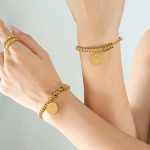 Minimalist 18K gold plated titanium steel bead bracelet and textured ring jewelry set