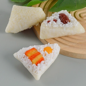 Realistic PVC Zongzi food model set with meat, egg yolk and jujube details on wood tray