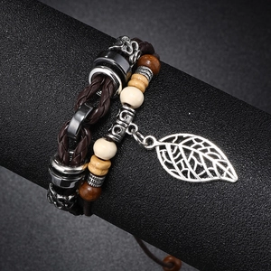Detail of multilayer beaded leather bracelet with hollow leaf pendant on display