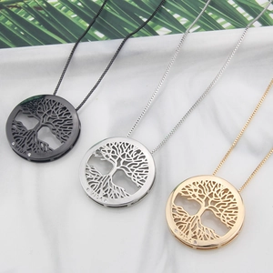 18k gold plated tree of life necklaces in gold, silver, and black with Vida engraving